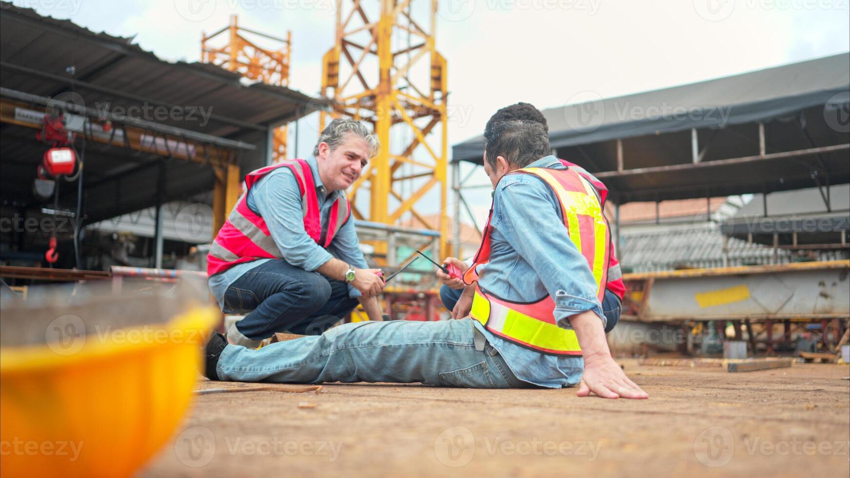 A worker on a construction site was injured when a piece of iron fell on leg photo