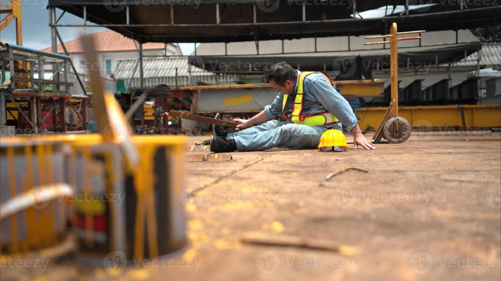 A worker on a construction site was injured when a piece of iron fell on leg photo