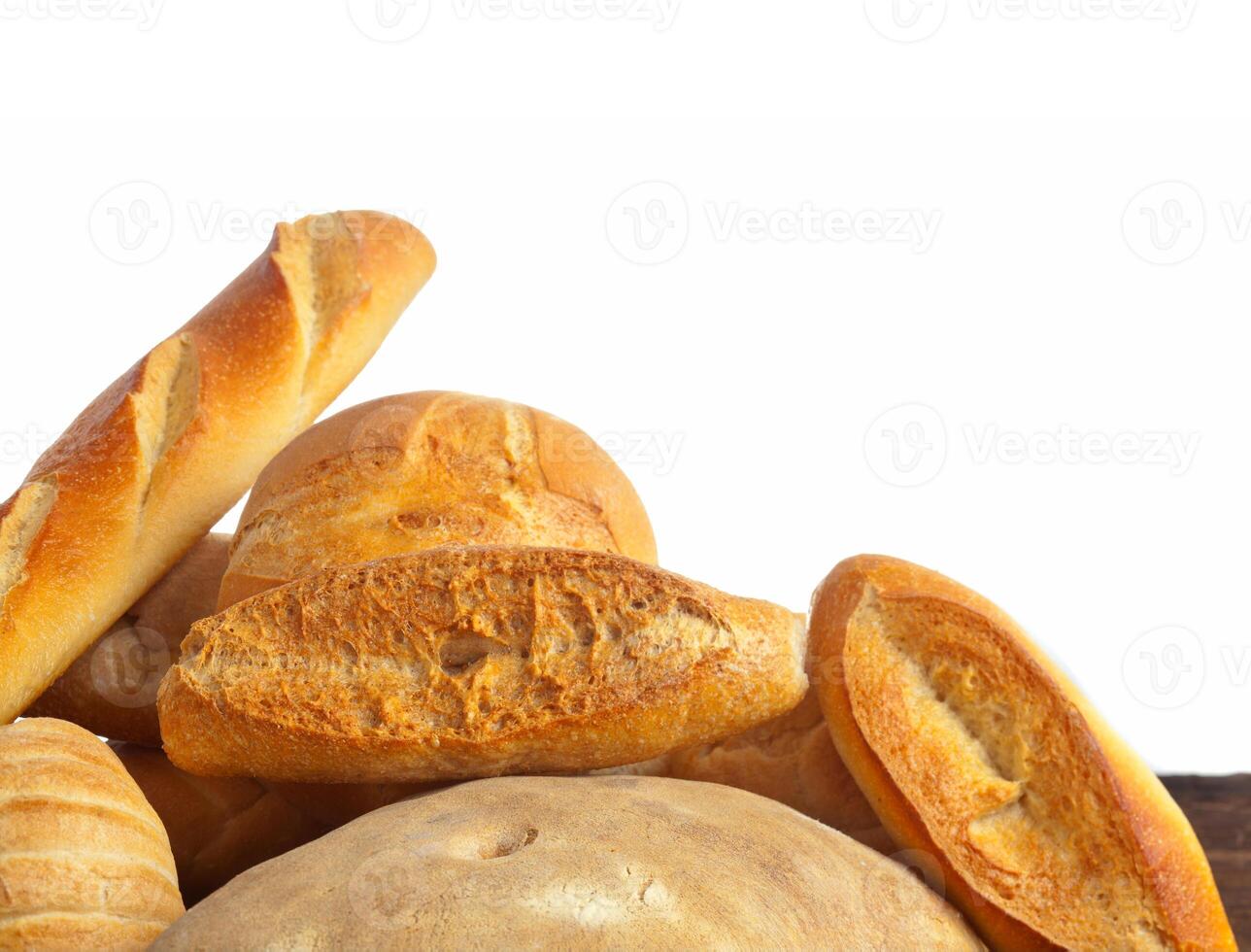 A pile of breads on a table photo