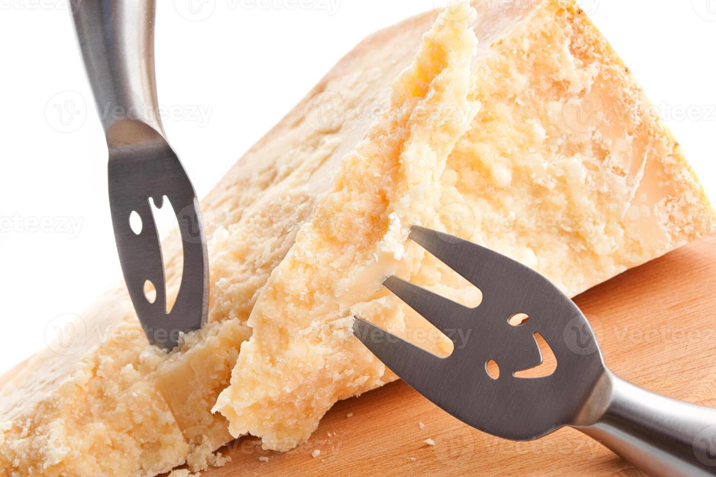 A cheese knife with a smiley face on it photo