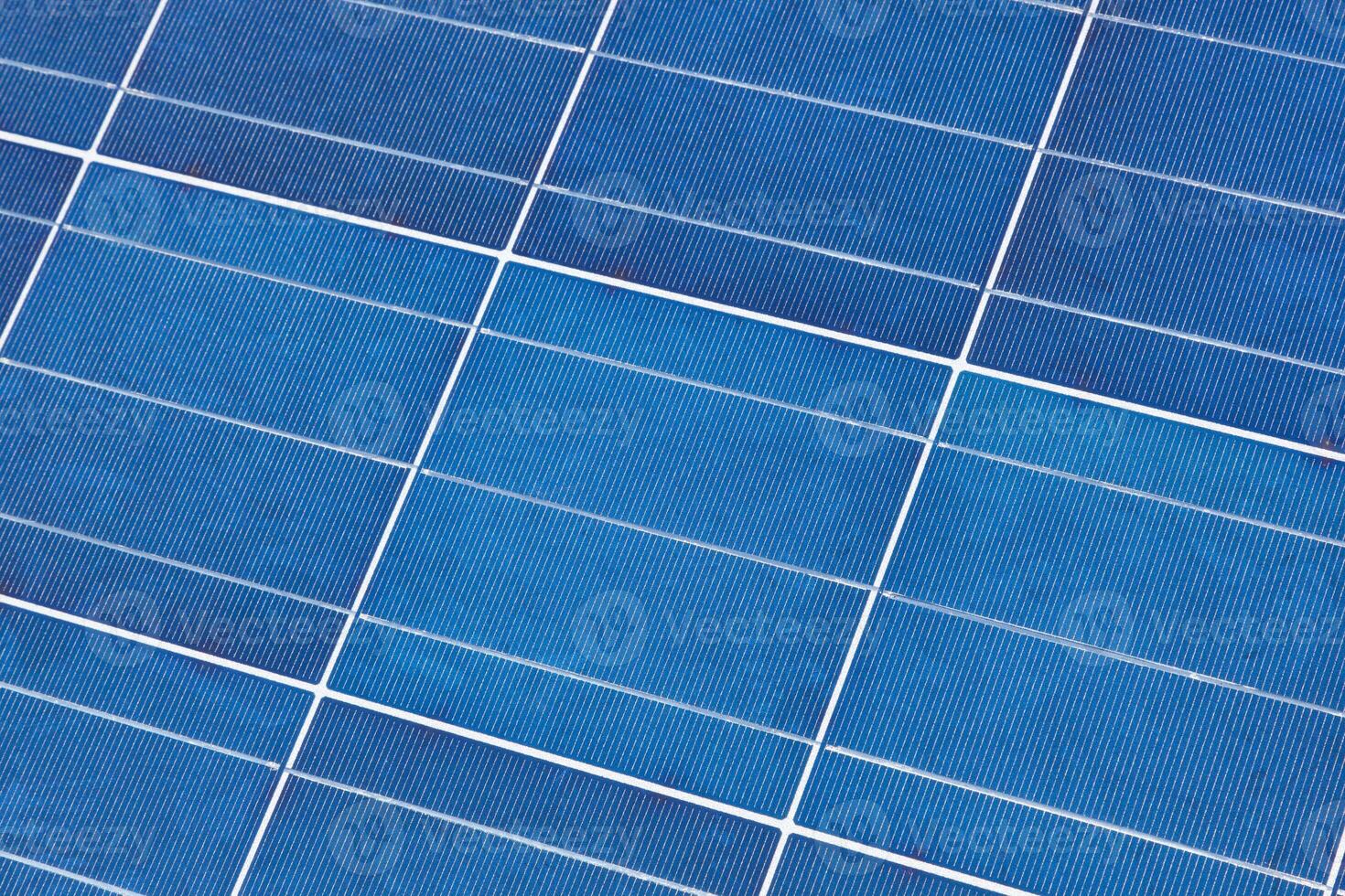 A close up of a solar panel with blue squares photo