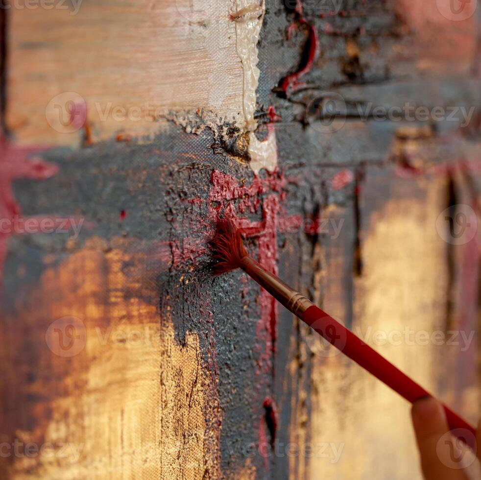 Detail of the brush on a painting on canvas. photo