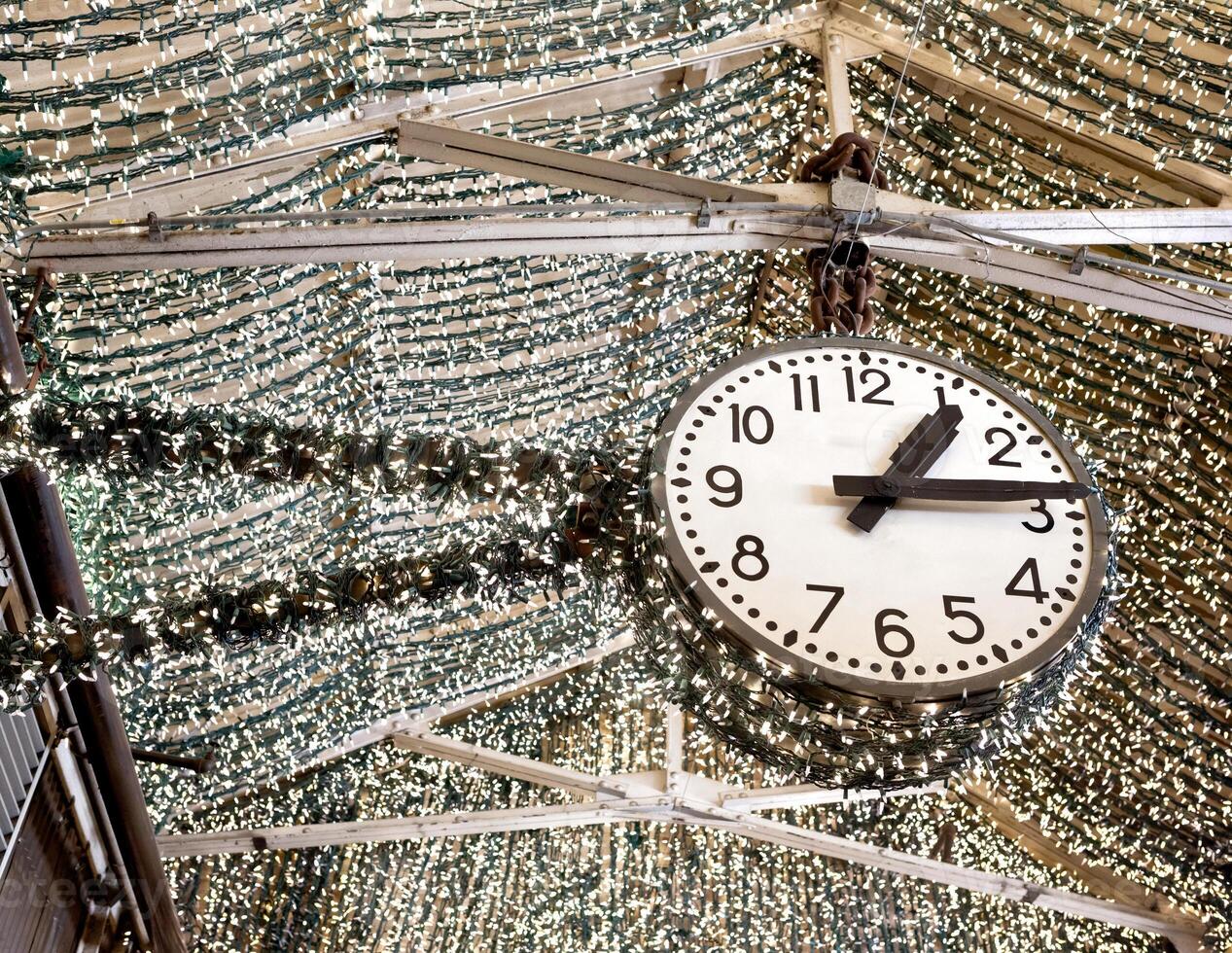 Clock with lights inside Chelsea Market photo