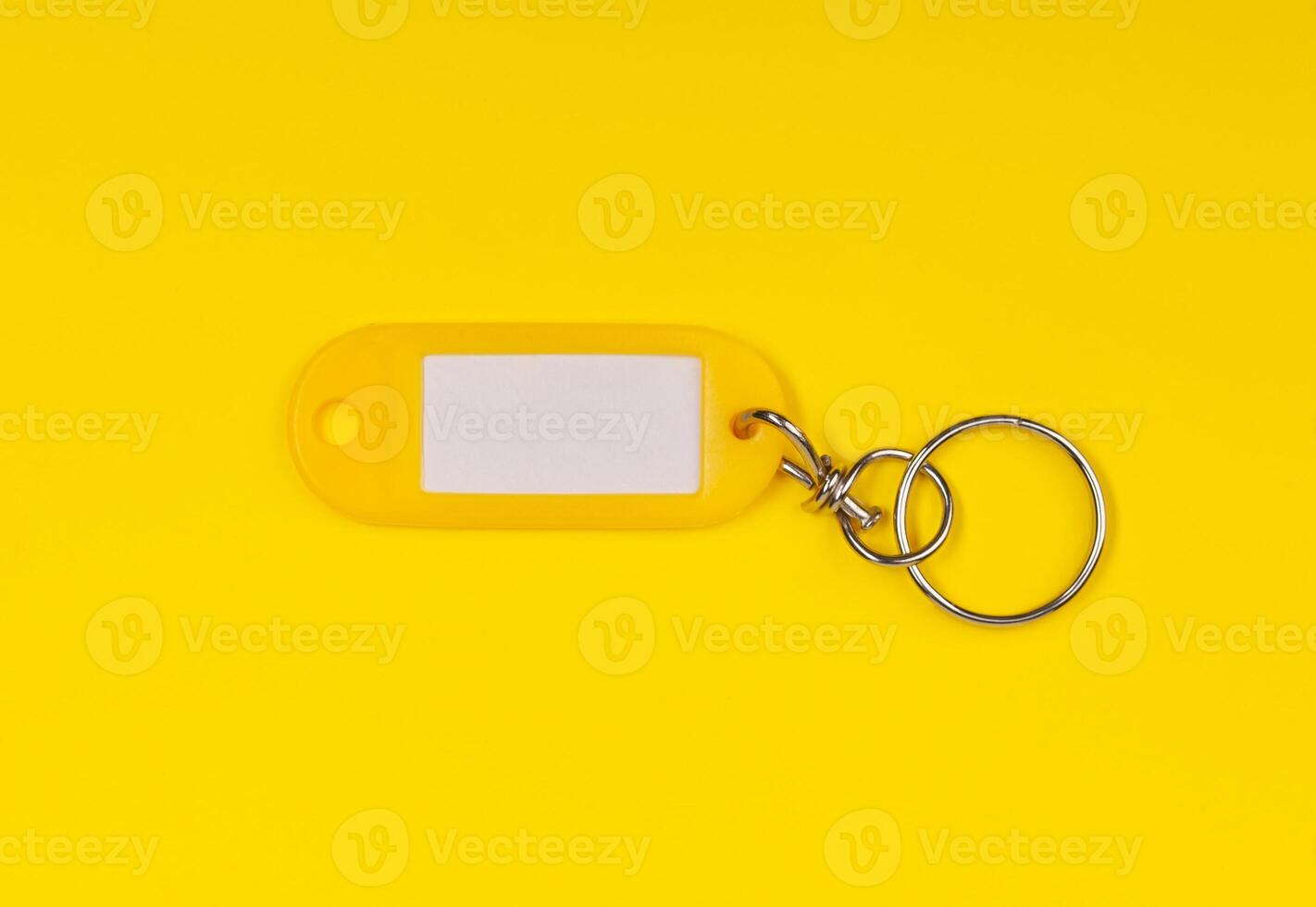 Vintage looking yellow key ring. photo