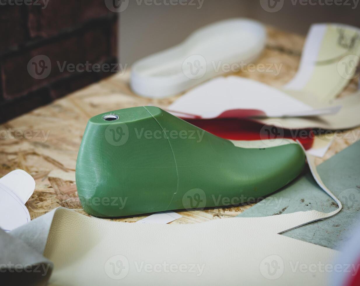 Workplace of shoe designer. photo