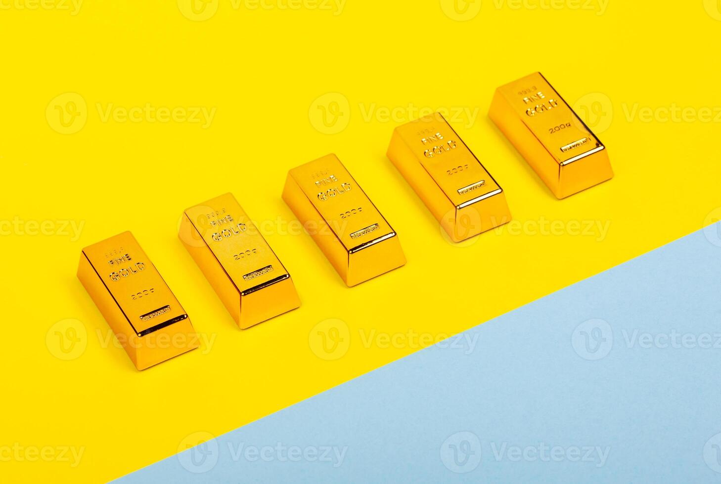 Flat lay with bars of gold bullion. photo