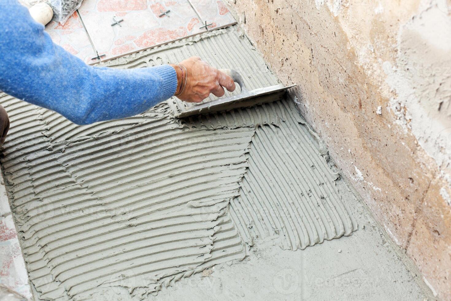 Tiler to work with tile flooring photo
