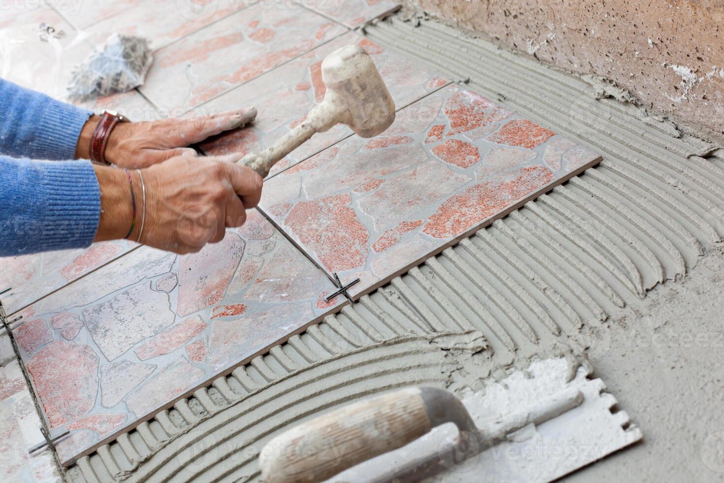 Tiler to work with tile flooring. photo