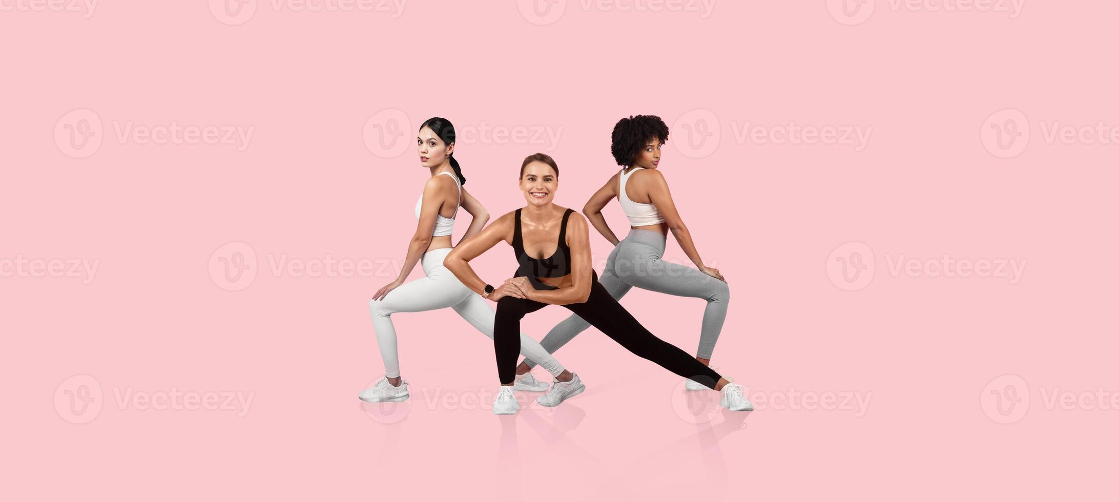 Three diverse fitness models perform various exercise poses. They showcase strength and flexibility, highlighting different aspects of fitness in a vibrant and energetic atmosphere. photo