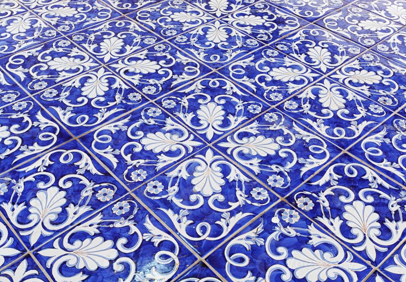 Tile texture background with blue majolica photo