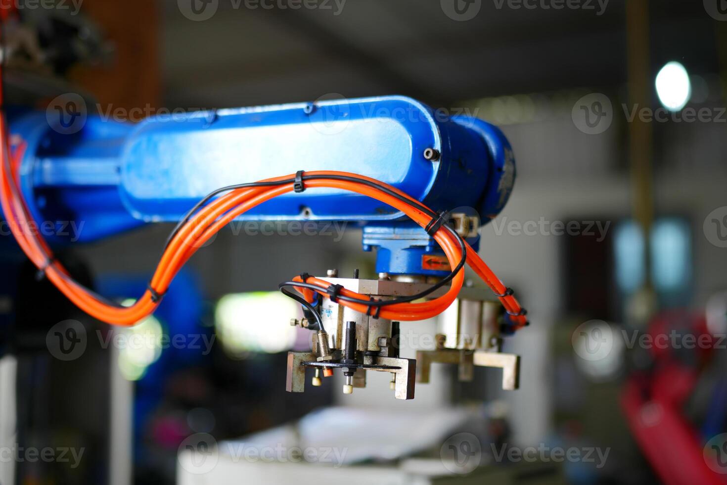 A close up of a robotic arm with wires photo