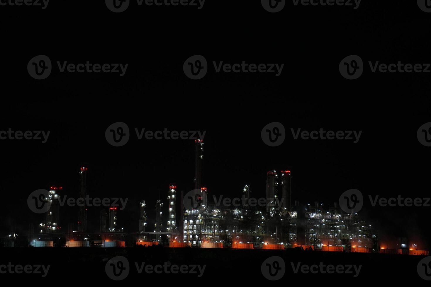 A large oil refinery at night photo