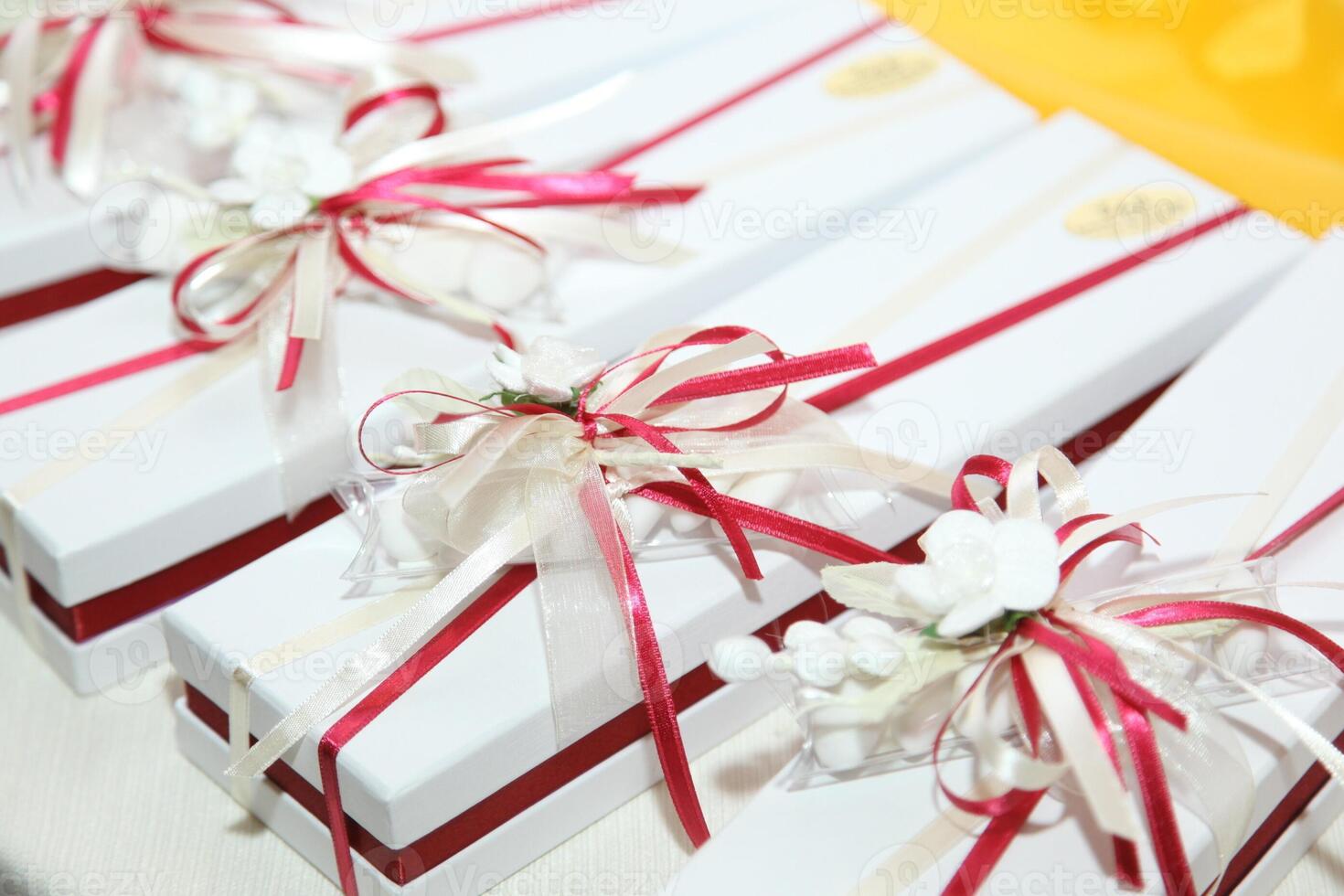 Beautiful wedding favors wrapped in cute boxes photo
