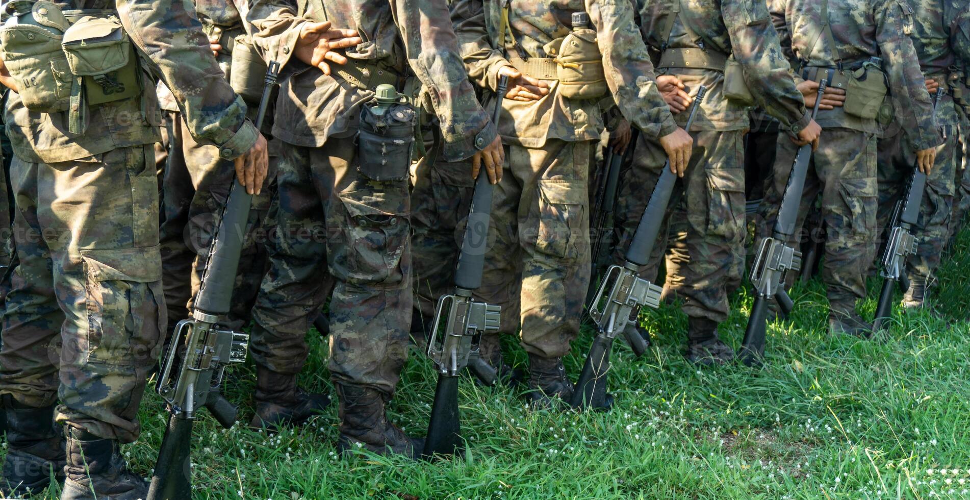 A group of soldiers standing in a row photo