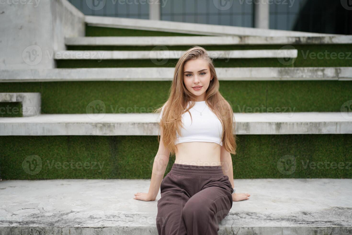 Portrait of blonde girl with fluttering hair photo