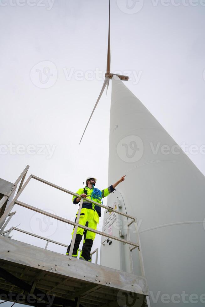 Man standing on a ladder photo