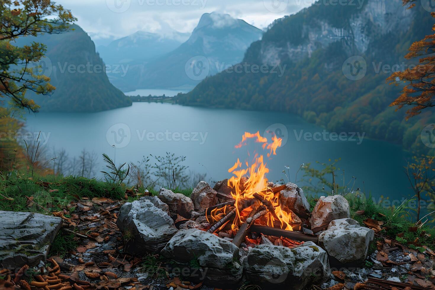 Tranquil Lakeside Campfire with Mountain View for Outdoor Adventure and Relaxation photo