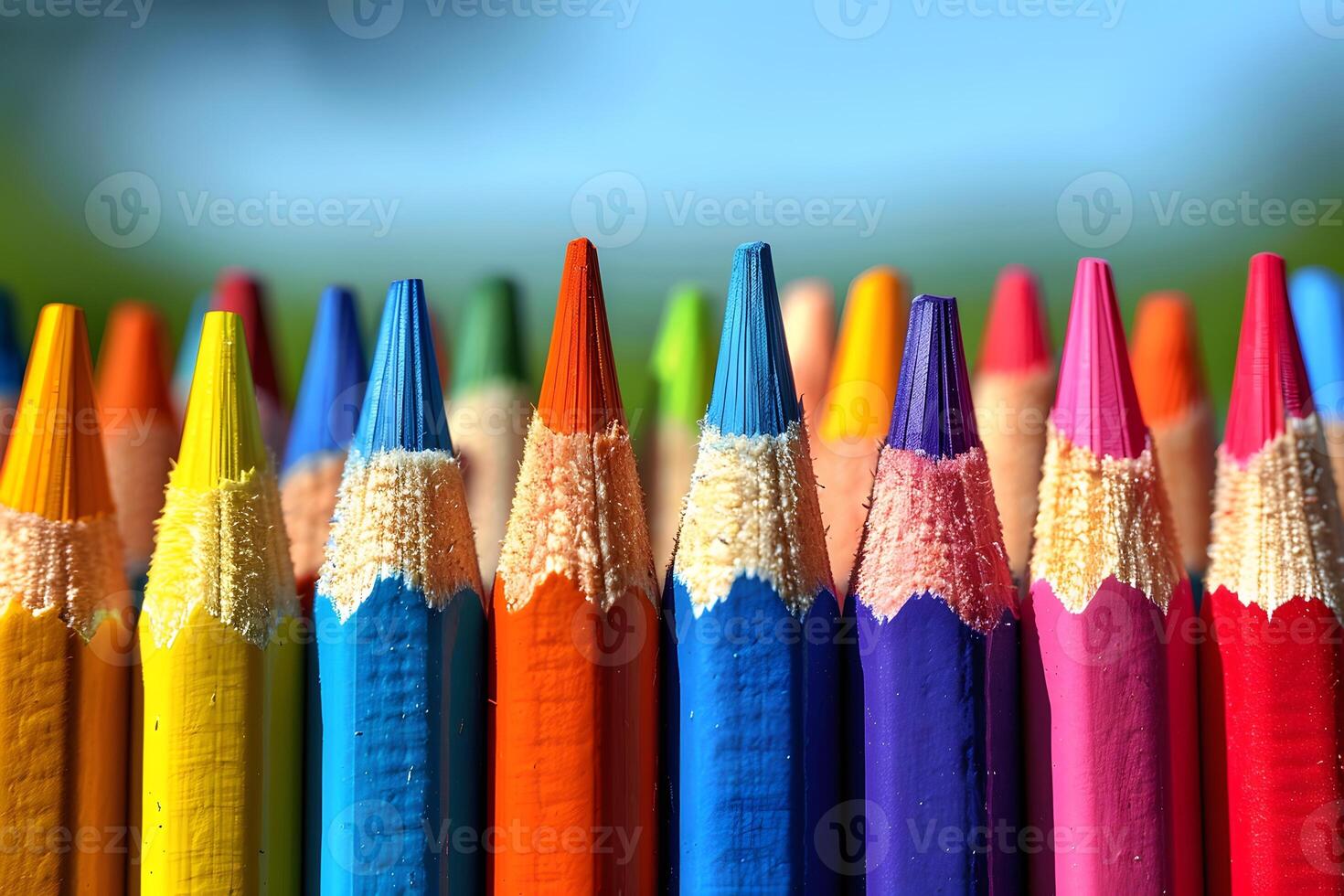 Vibrant Array of Sharpened Colored Pencils Against a Blurred Background for Creative Projects photo