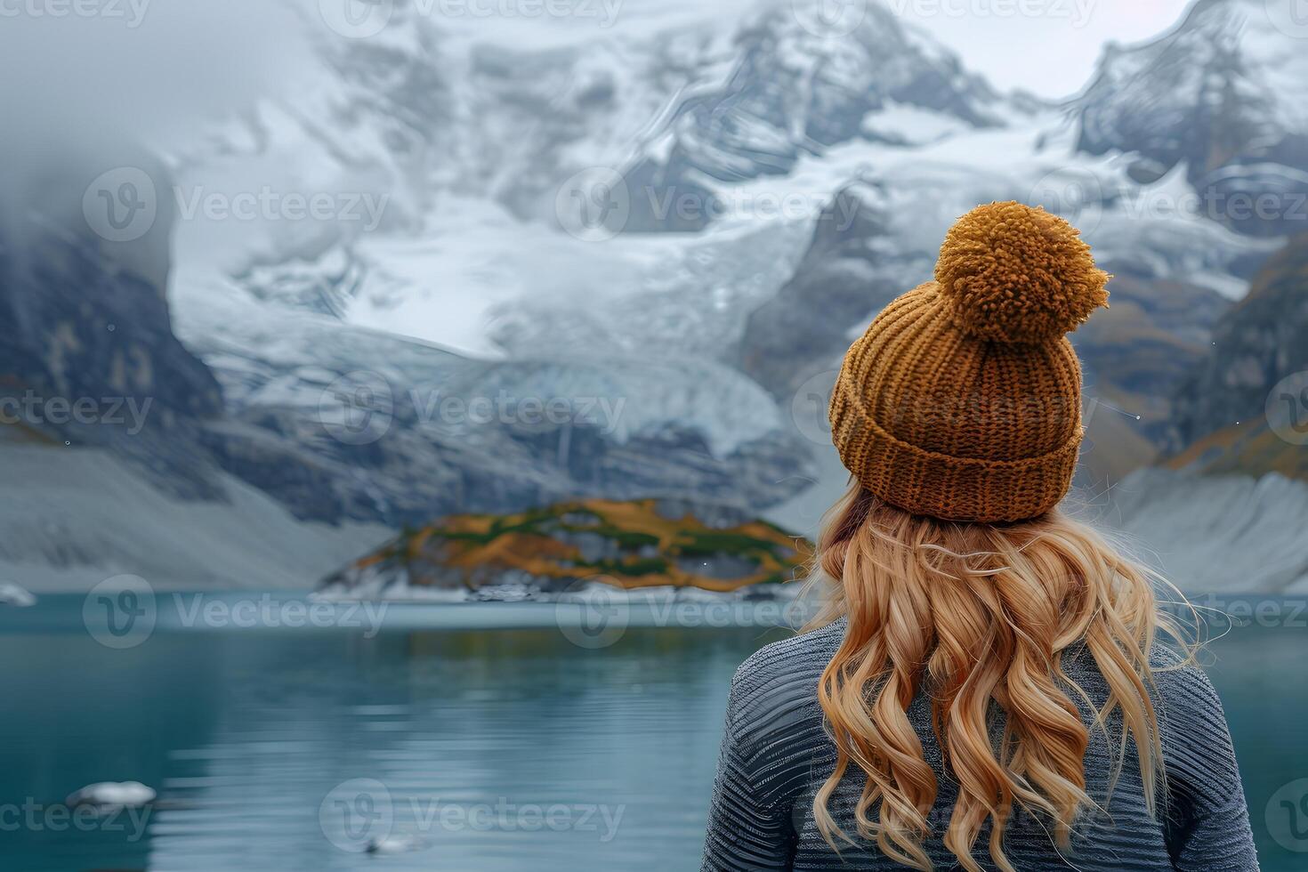 Tranquil Reflection at Alpine Lake Scenic Winter Escape with Snowy Mountains photo