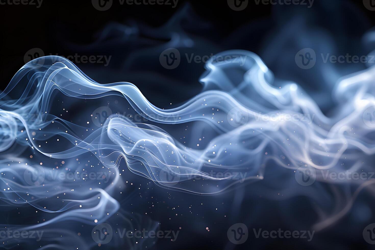 Ethereal Swirls of Blue Smoke with Sparkling Dust Particles for Abstract Art and Design photo