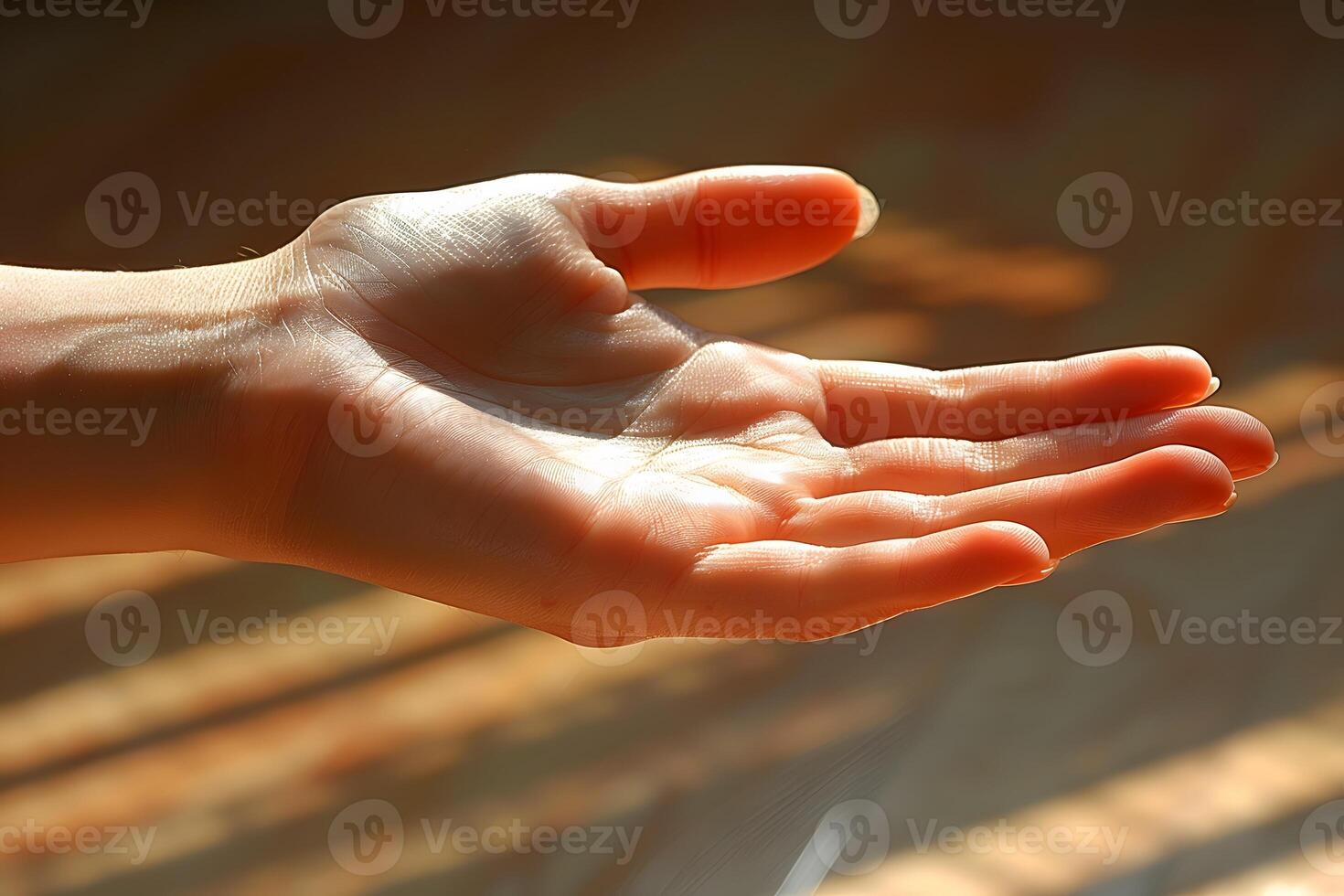Outstretched Hand in Sunlight - Concept of Giving and Connection photo