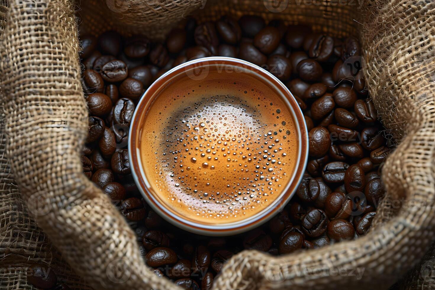Rich Espresso in Burlap Bag with Roasted Coffee Beans - Perfect for Cafe Decor and Marketing photo