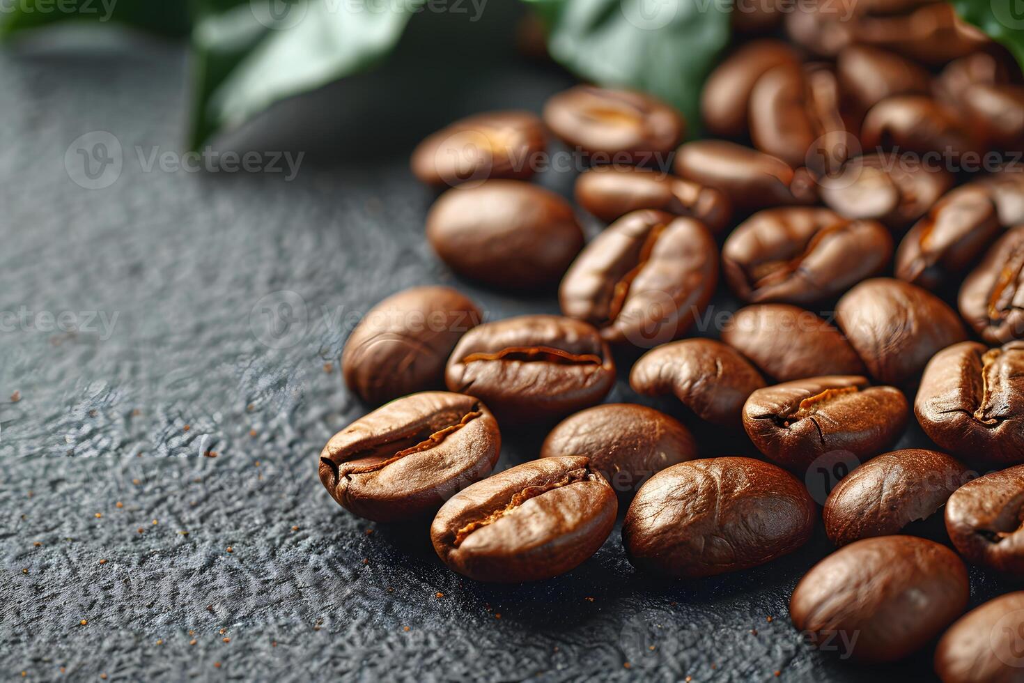 Fresh Roasted Coffee Beans with Leaves on Dark Textured Surface Perfect for Cafe and Beverage Design photo