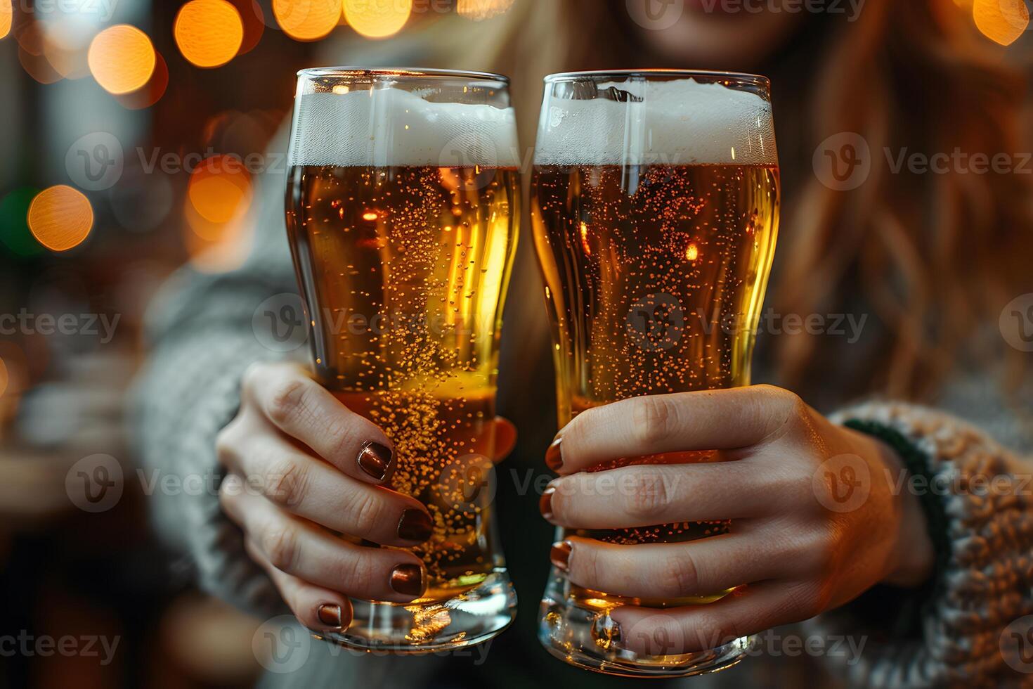 Toasting with Two Glasses of Beer in Festive Setting with Warm Bokeh Lights photo
