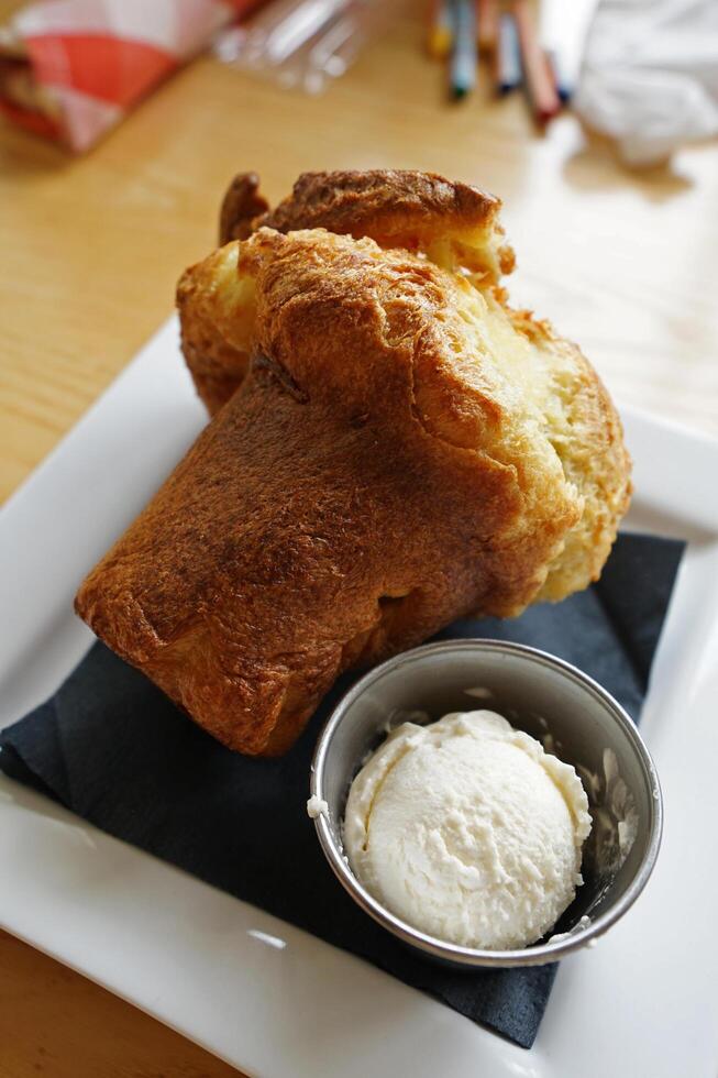 Close up crispy bread toast served with clotted cream curd photo