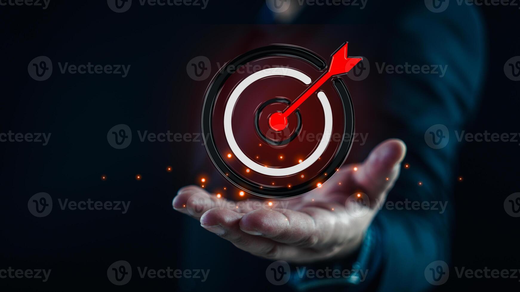 Motivation targets a circular target with an arrow placed precisely in the middle of the target. photo