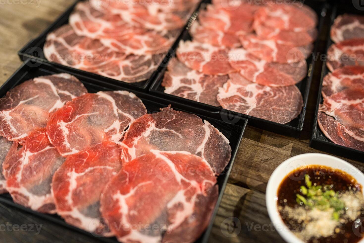 Various types beef and pork on tray hot pot ingredients. photo