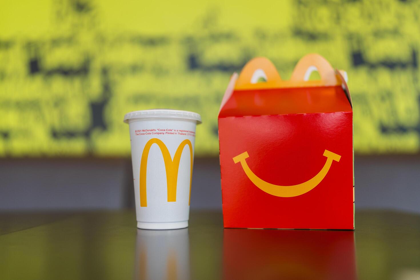 BANGKOK, THAILAND - DECEMBER 06, 2024 Mcdonald Happy meal with smile on box and beverage. photo