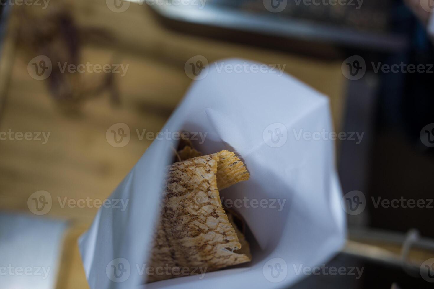 Dried squid in paper bag photo