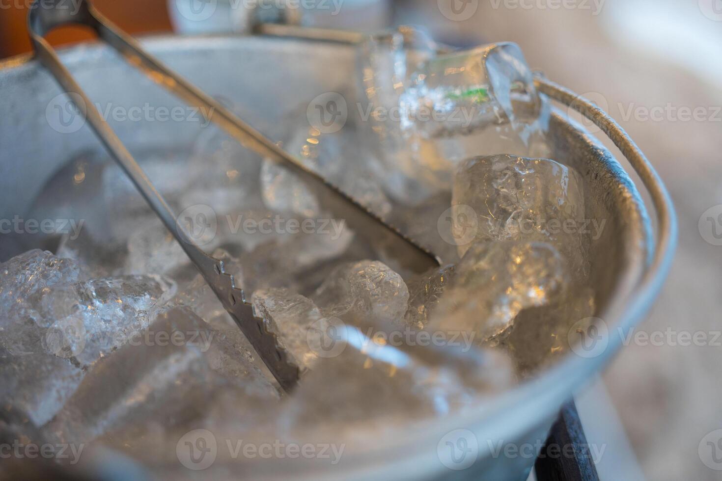 A bucket of ice with a trowel photo