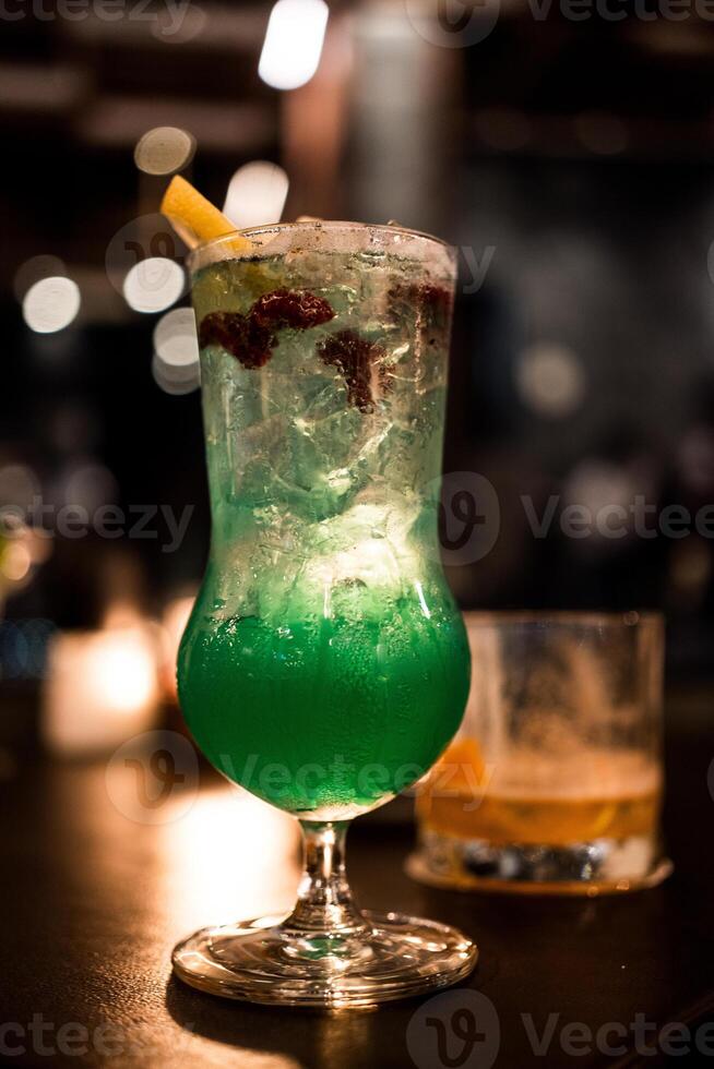Cocktail on bar counter photo