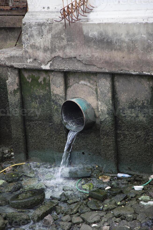 A pipe that is leaking water out of it photo