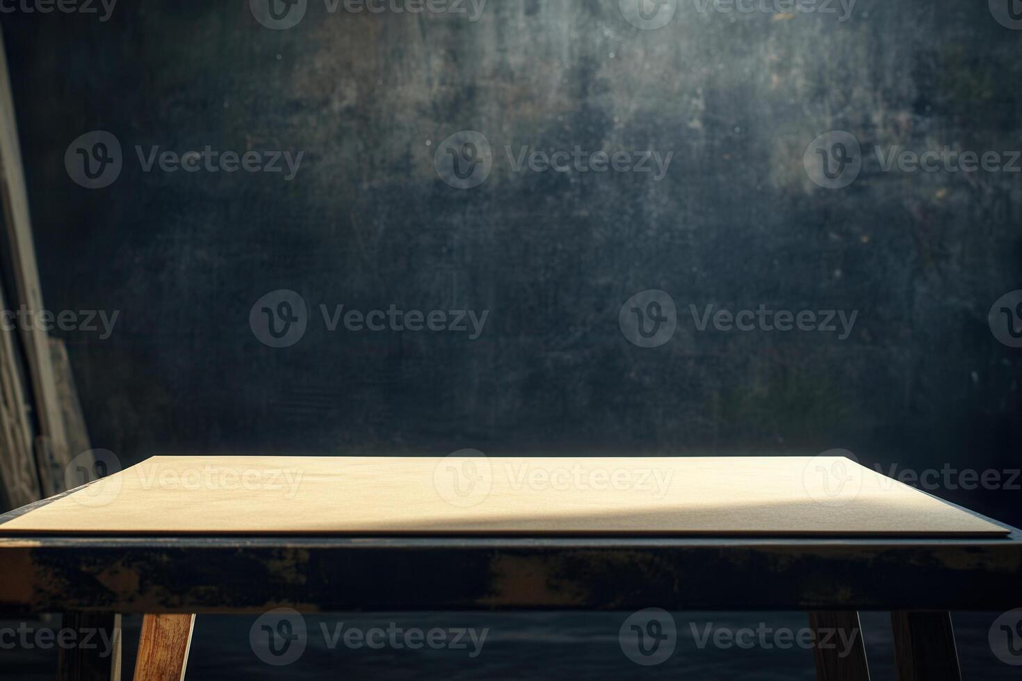 A simple wooden table in a dimly lit space. photo