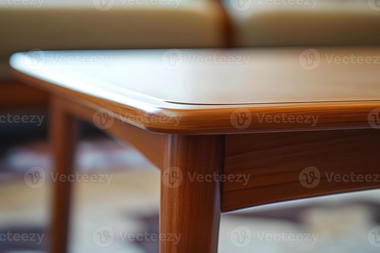 A close-up of a wooden coffee table corner. photo