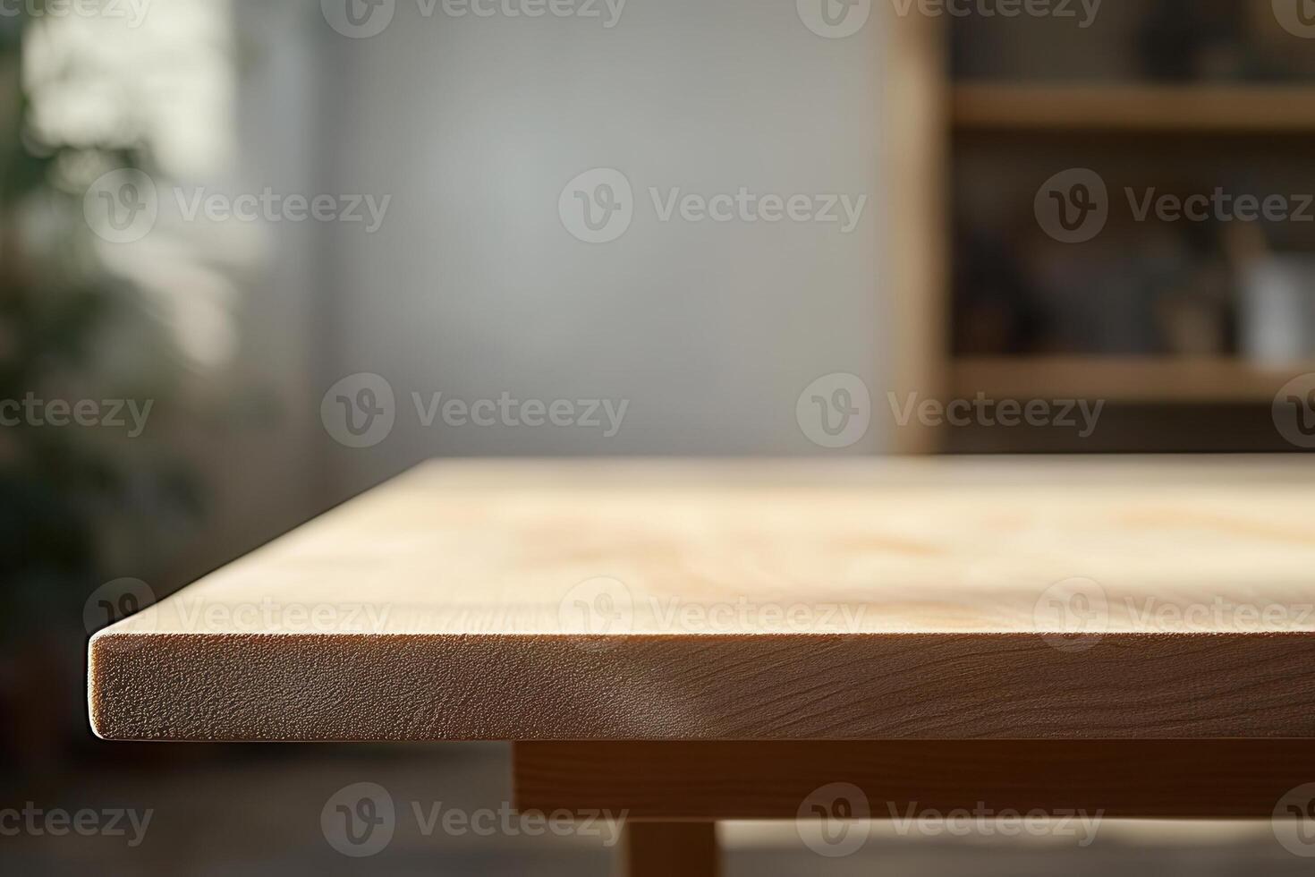 Close-up of a wooden table edge in a bright room. photo