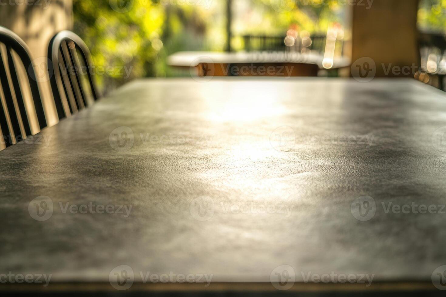 A close-up view of a textured table surface outdoors. photo