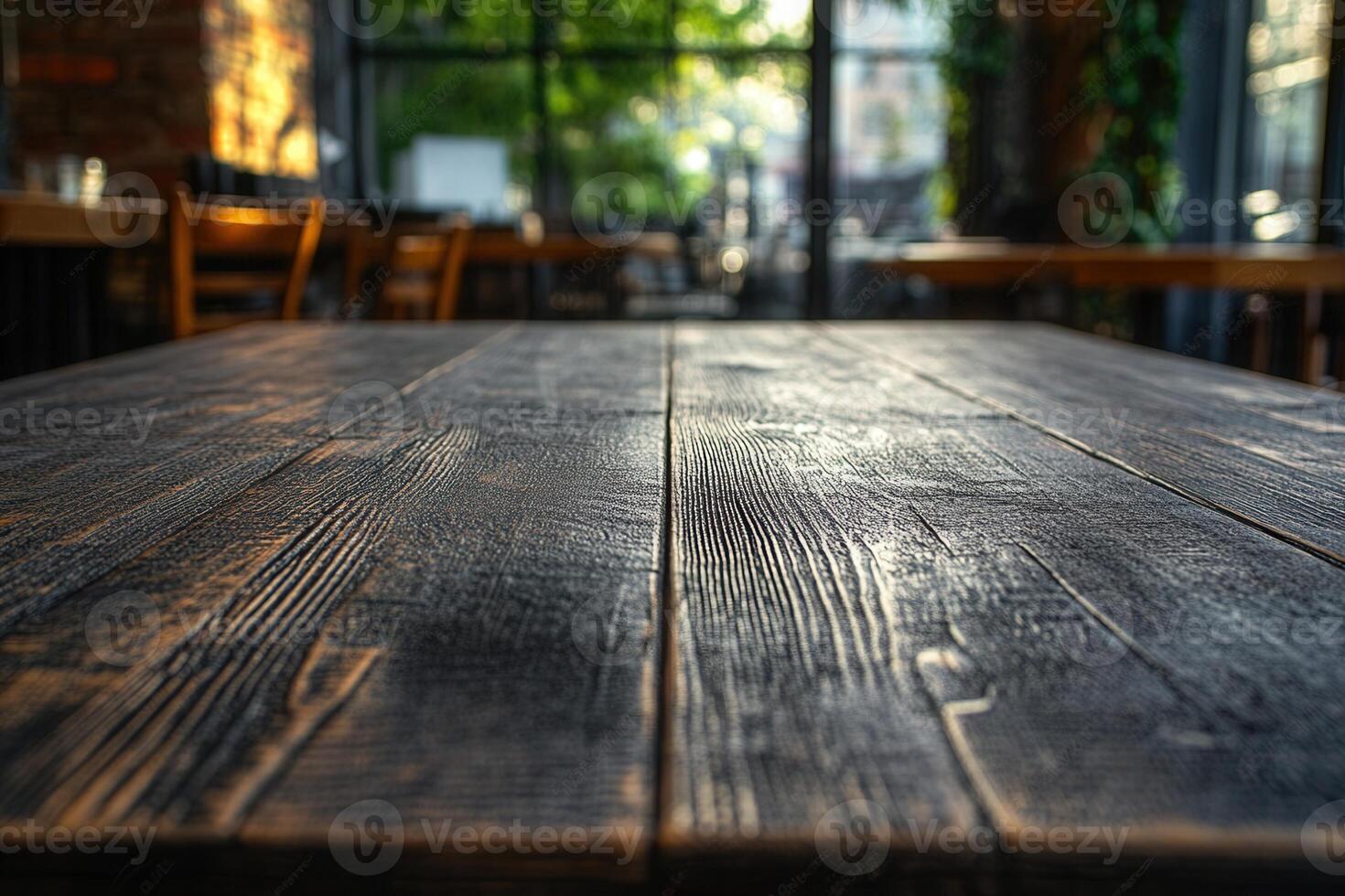 Close-up of a rustic wooden table in a cozy cafe. photo