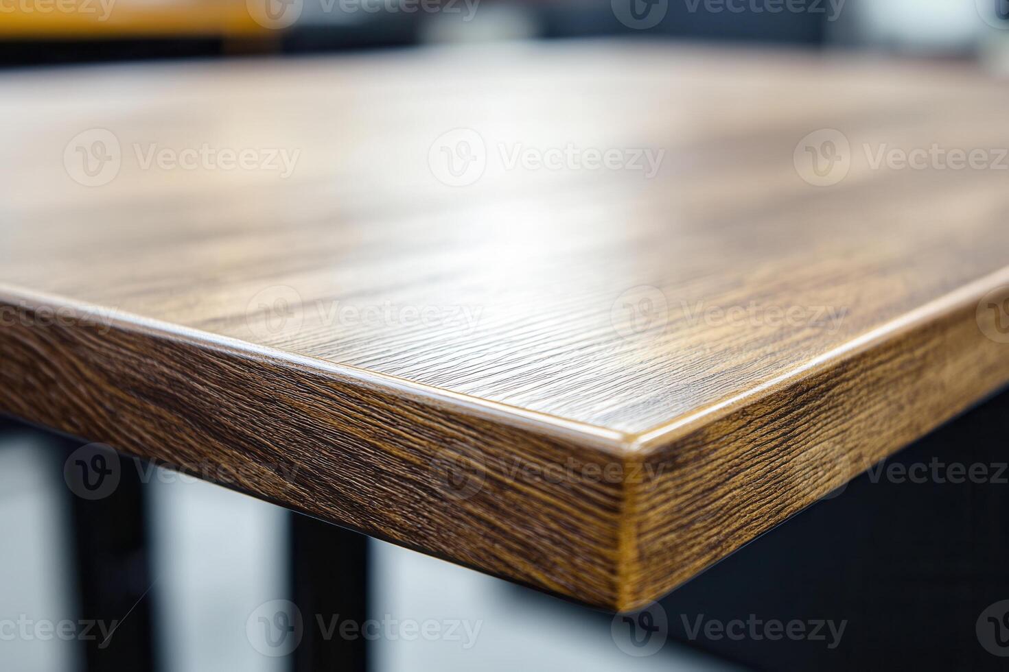 Close-up of a wooden table surface with a smooth finish. photo