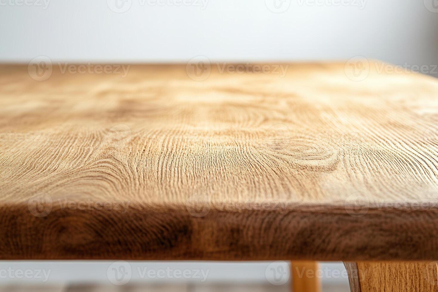 Close-up of a wooden table surface showcasing texture. photo