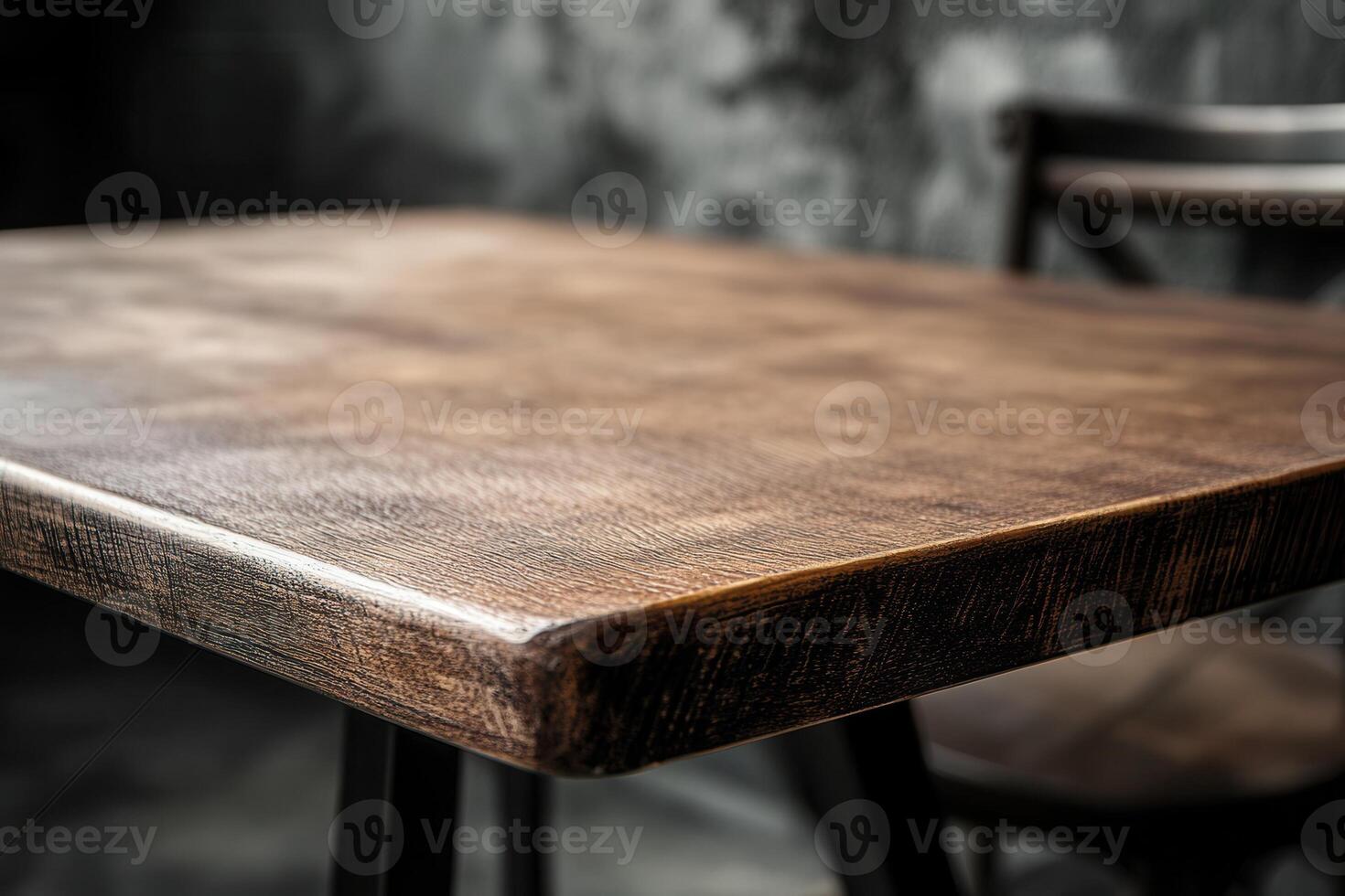 Close-up of a wooden table surface with a rustic finish. photo