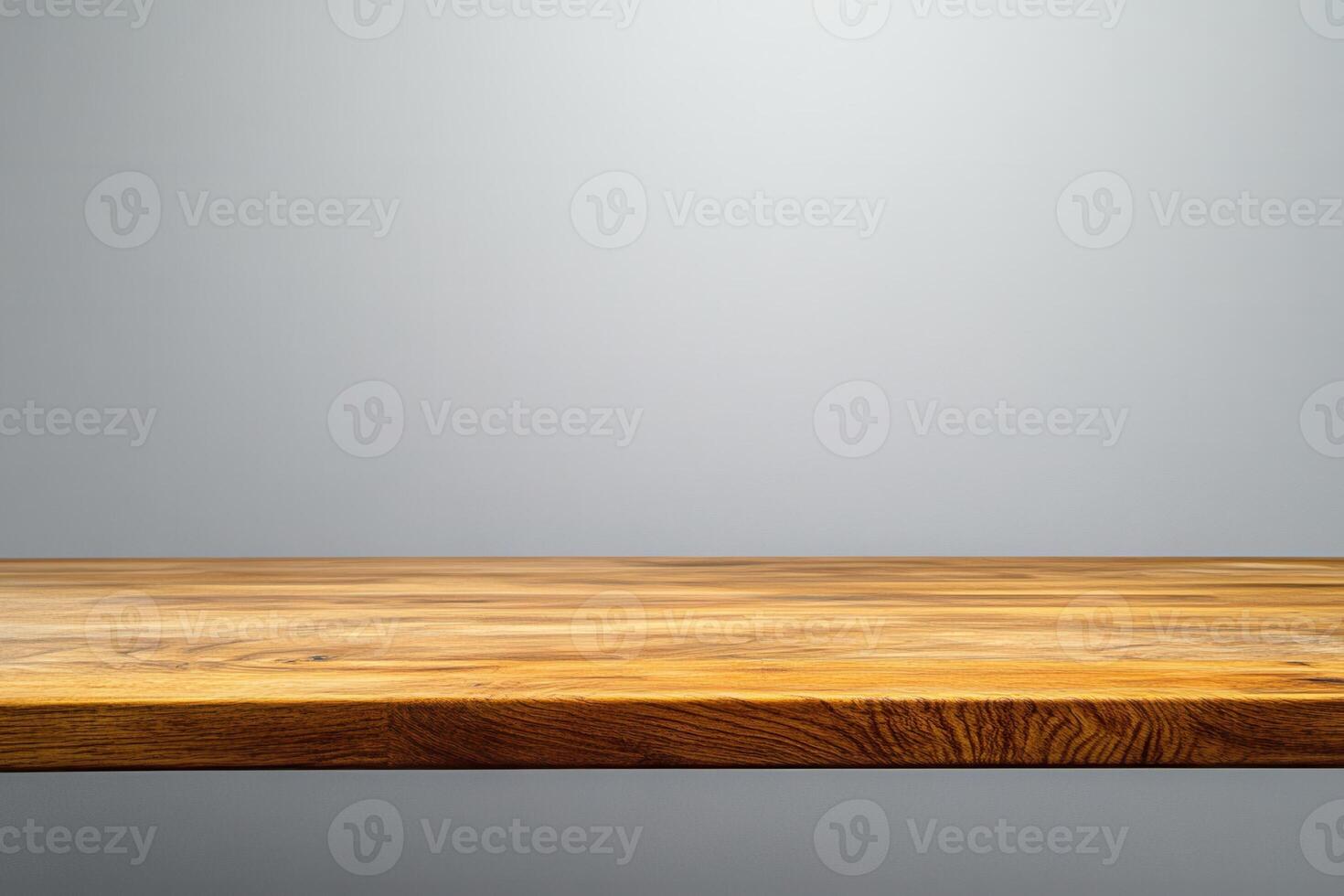 Wooden table surface with a minimalistic background. photo