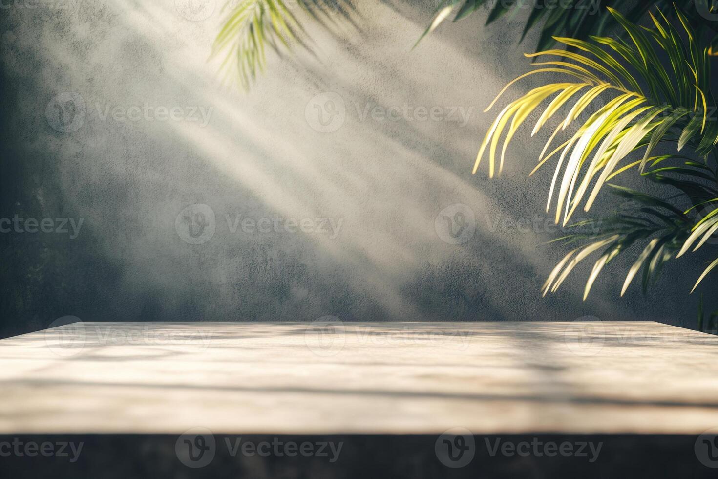 Sunlit table with tropical foliage backdrop. photo