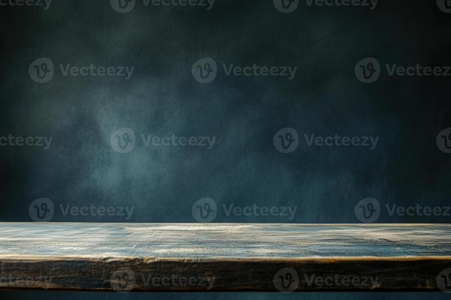 Dark background with a wooden tabletop. photo