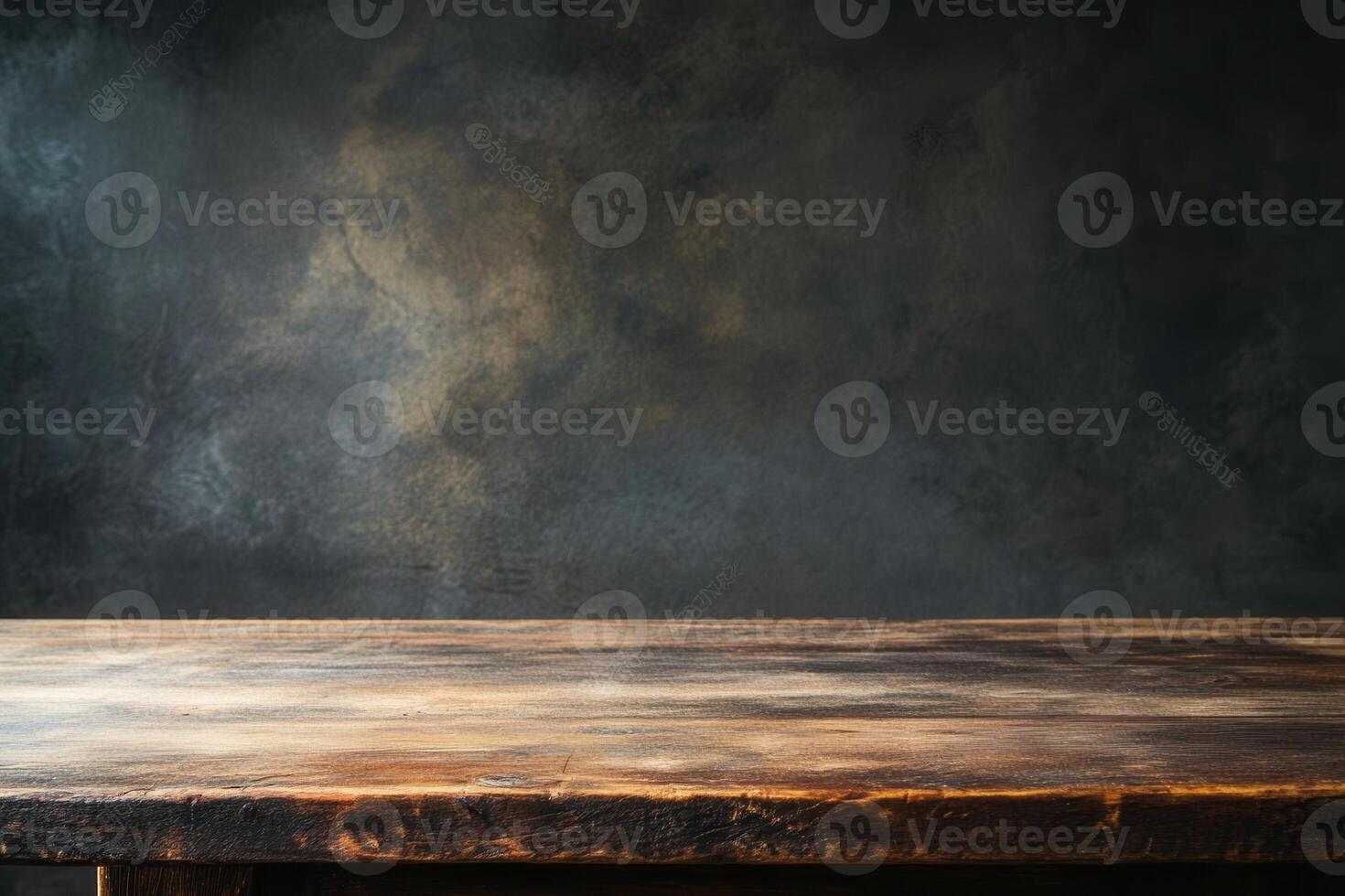 Rustic wooden table against a textured dark background. photo