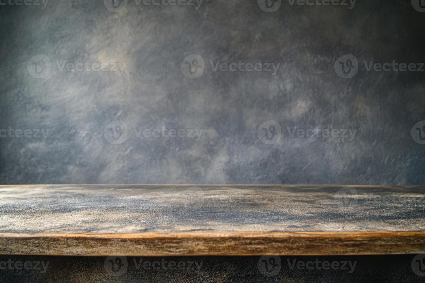 Rustic wooden table with textured background. photo