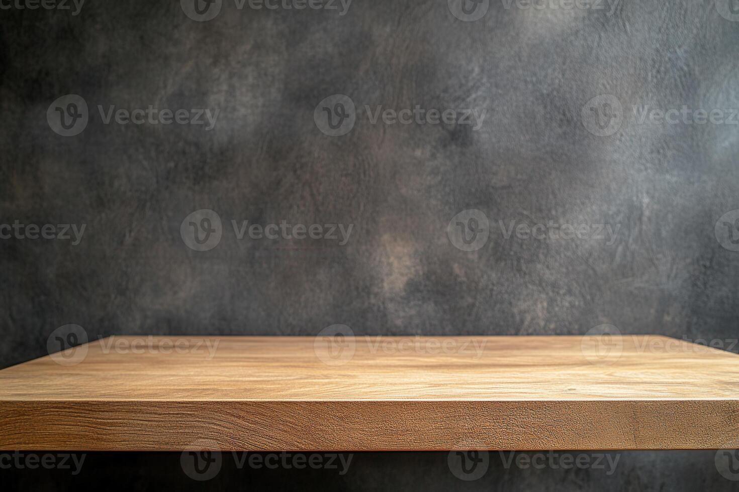 Wooden tabletop against a textured dark wall background. photo